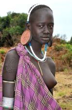 Ethiopia young Mursi women with big ear plates