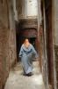 Marocco woman in a alley