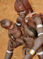 Ethiopia Hamar mother with twins